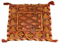 Sheep's wool felt rug measuring 76 cm x 74 cm of the Han dynasty unearthed in 1983 at the Shanpula cemetery site in Lop county and now in the collection of the Xinjiang Regional Museum, Urumqi.